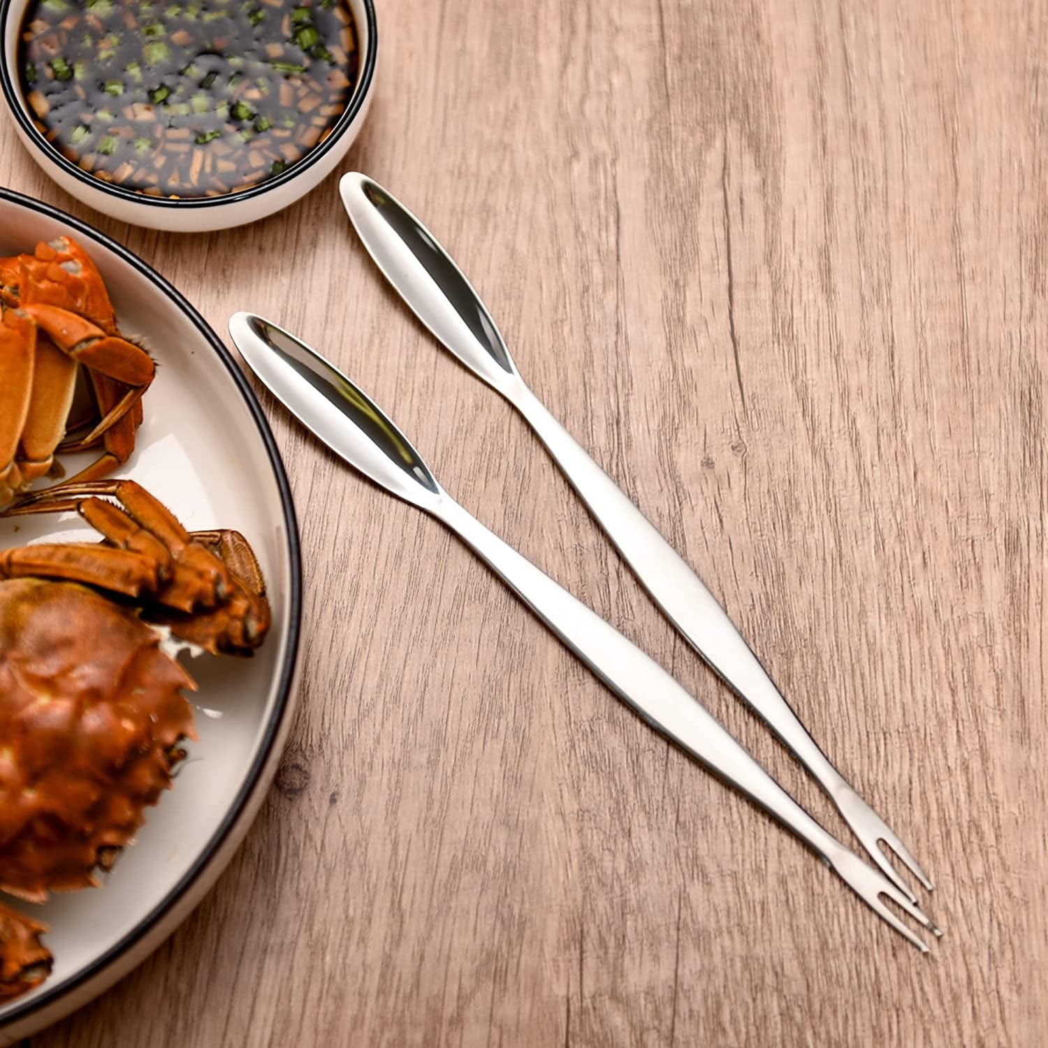 IMEEA Seafood Forks Picks SUS304 Stainless Steel with dual ended design displayed on a dining table
