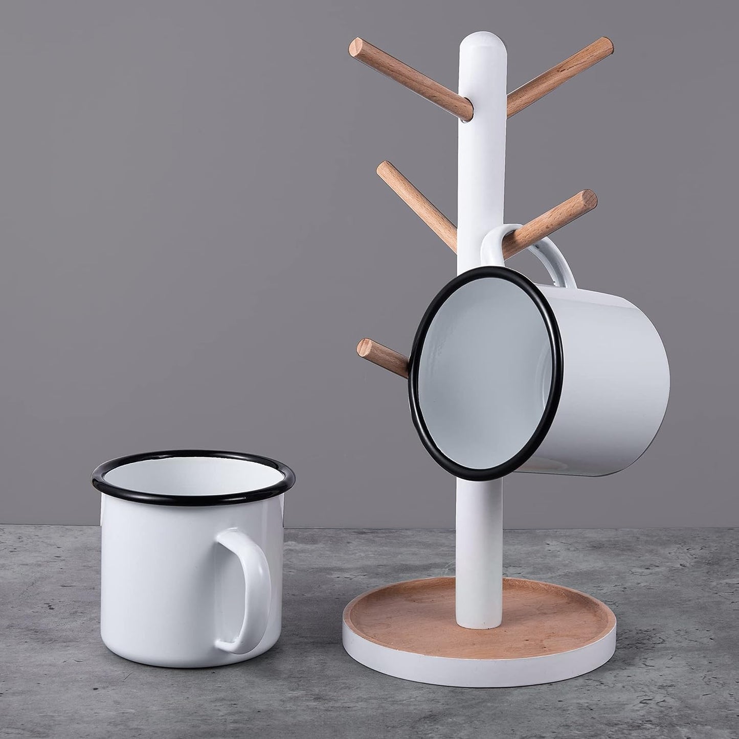 IMEEA White Enamel Cup displayed on a wooden holder with a convenient handle design for easy hanging storage