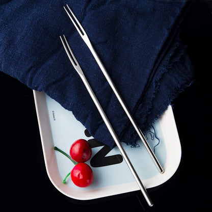 SUS304 Stainless Steel Fruit Fork with Long Handle placed in a fruit tray