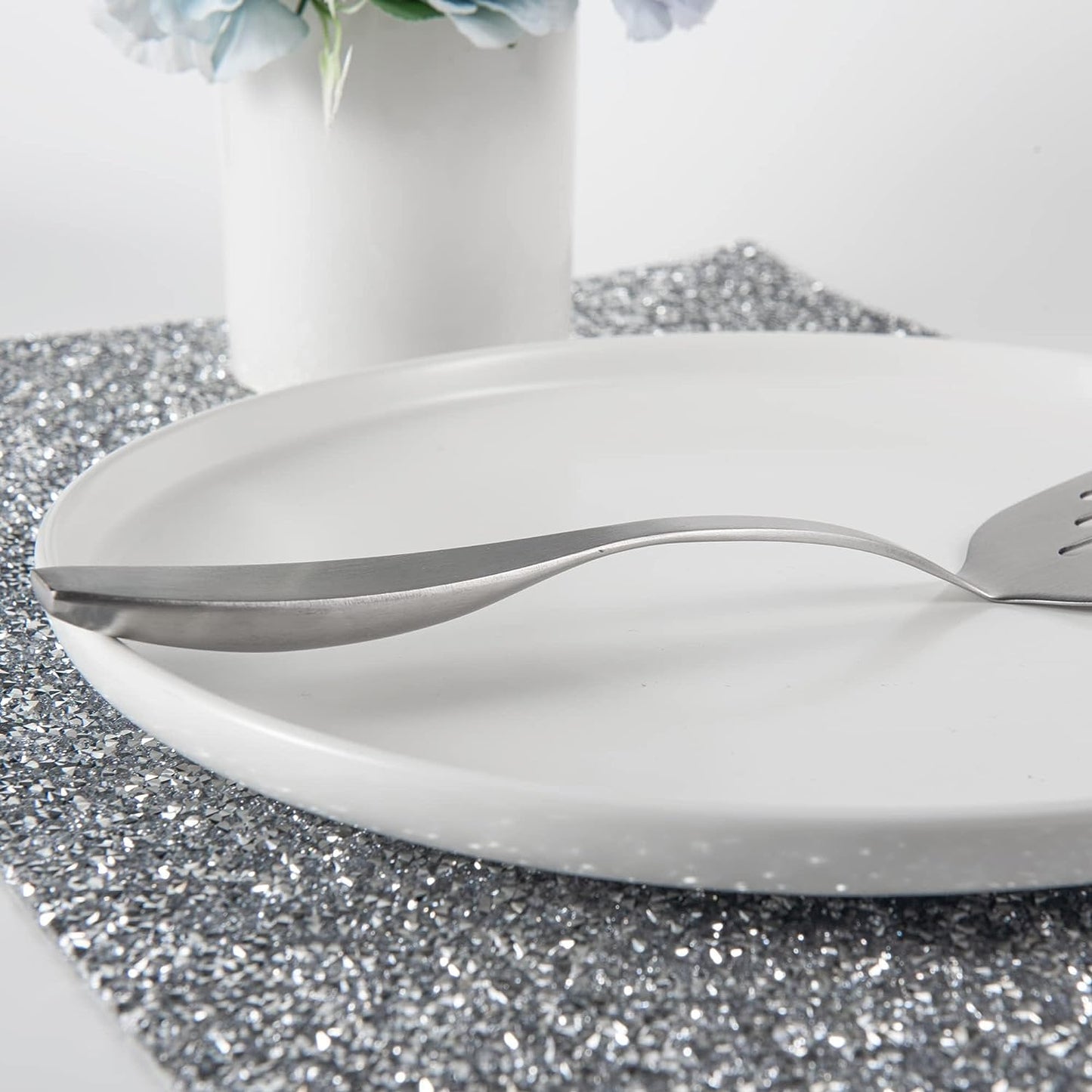 Ergonomic Stainless Steel Mini Turner handle detail showcasing a comfortable curved grip design