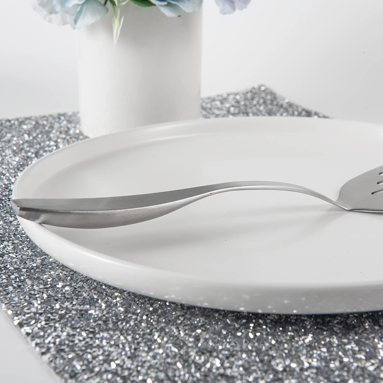 Ergonomic Stainless Steel Mini Turner handle detail showcasing a comfortable curved grip design