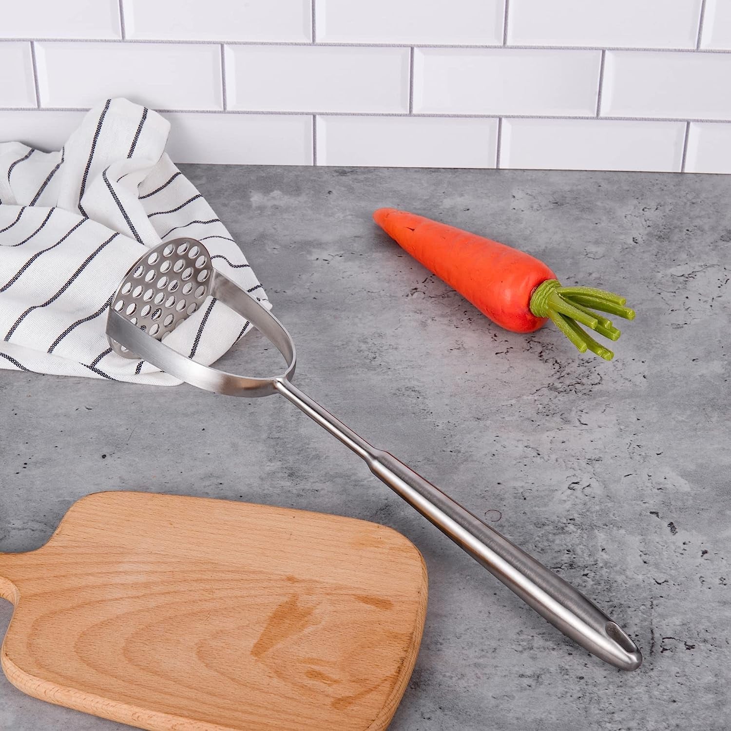 SUS304 Stainless Steel Potato Masher placed on tabletop