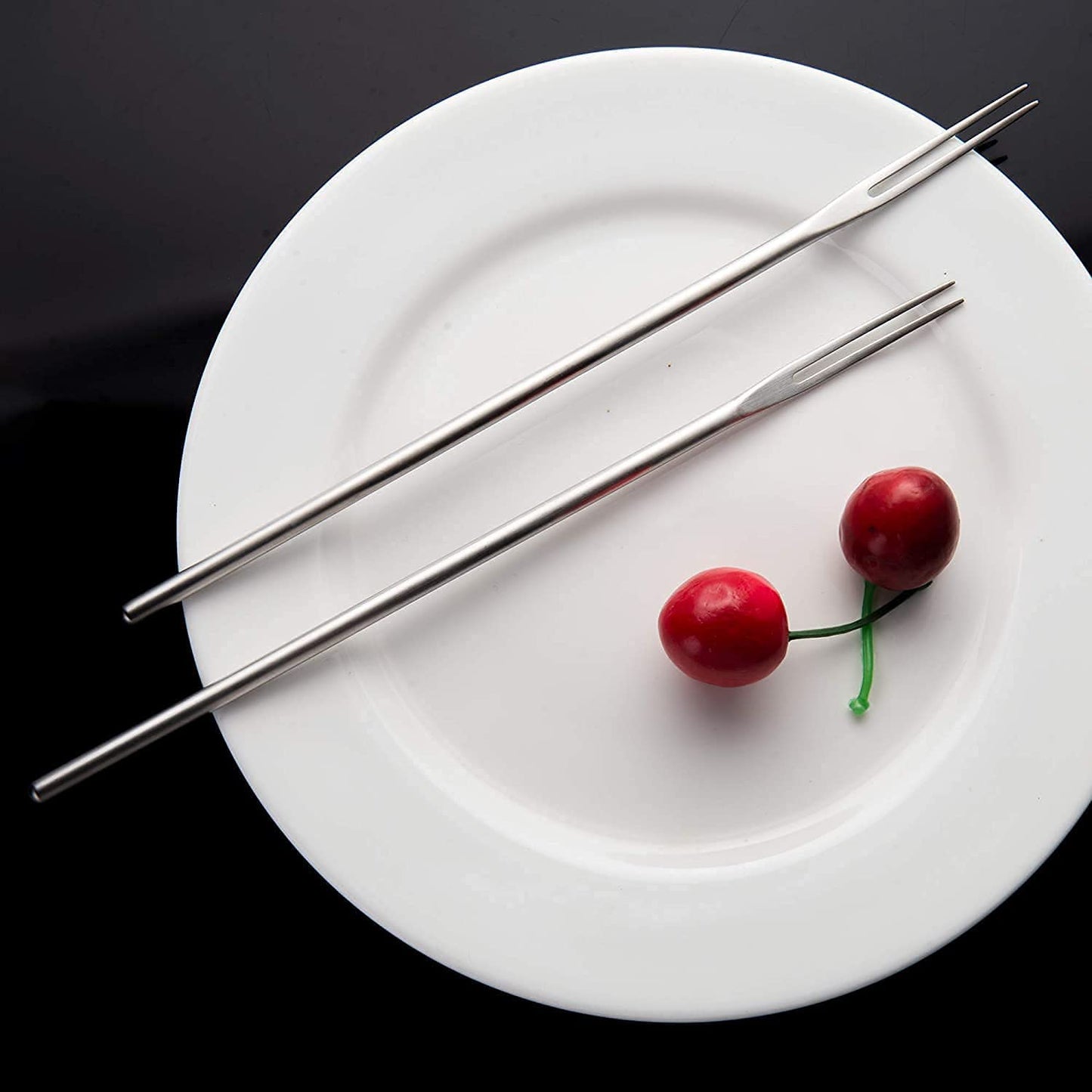 Minimalist SUS304 Stainless Steel Olive Fork placed on plate