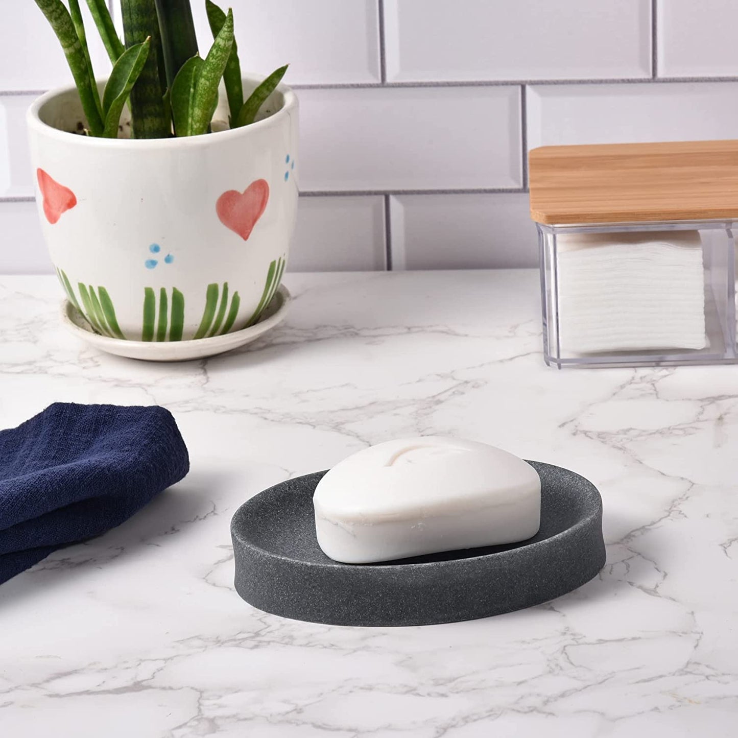 IMEEA Resin Soap Dish holding bar soap on a countertop for everyday use