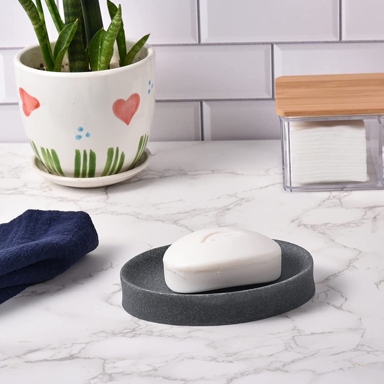 IMEEA Resin Soap Dish holding bar soap on a countertop for everyday use