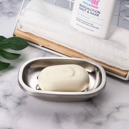Polished SUS304 Stainless Steel Soap Dish placed on a bathroom counter with a simple and clean design