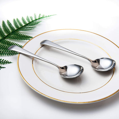 Stainless Steel Soup Spoon resting on a plate as part of a refined dining setup