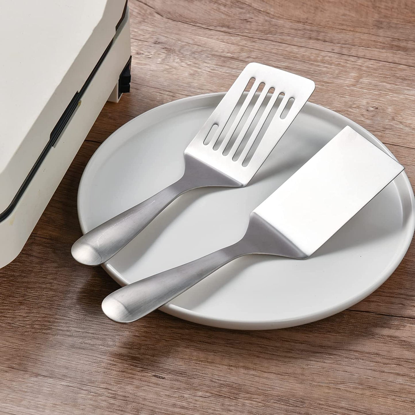 Compact 10 inch Stainless Steel Spatula Set displayed together on a tray with flat edge turner designs